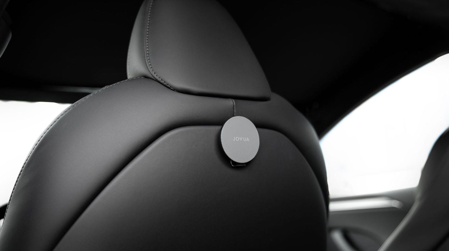 Telefoon, kaarten, sleutels — alles op zijn plek in je Tesla