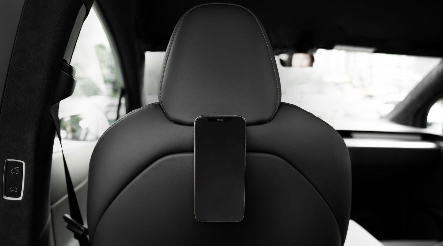 Telefoon, kaarten, sleutels — alles op zijn plek in je Tesla